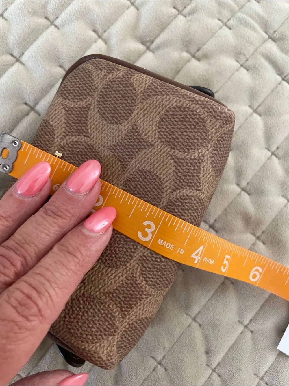 Coach Brown and Tan Interior Zip Pouch wristlet with Gold Hardware